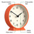 NEWGATE® M Mantel Echo Desk Clock | Modern Round Design | Pumpkin Orange | Easy to Read Numbers | Contemporary Style for Desk, Table, Shelf or Bedside