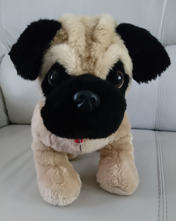 stuffed black pug dog