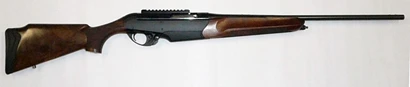 Benelli R1 308 semi-auto rifle with Walnut Stock - Excellent (approx. 95%) condition with original hard case.  Item #UB108