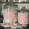 Large and small taffy jars with vintage labels