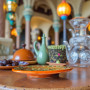Artisan Moroccan ceramic plate with hand-painted geometric starburst pattern