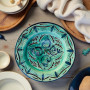 Moroccan dinnerware Glow and Clay ceramic plate in emerald green with leafy accents