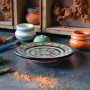 Traditional Moroccan ceramic dish with botanical concentric pattern Glow and Clay