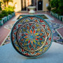 Traditional Moroccan ceramic dish with multicolor floral starburst Glow and Clay