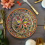 Traditional Moroccan ceramic dish with geometric floral star pattern