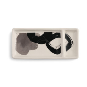 rectangular plate with two sections, one large and one small, with circular gray and black abstract painting design