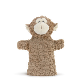 brown stuffed monkey standing up on flat base