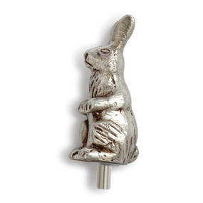Side view of silver bunny figurine topper