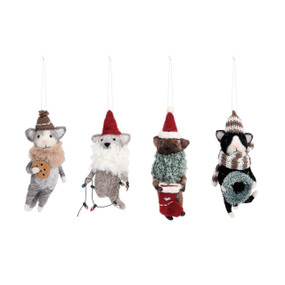 four different stuffed animal ornaments wearing different winter themed outfits