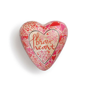 Small light pink/red heart with 'brave heart' carved in the center