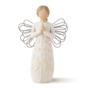 Front view of standing female figure with wire wings in cream dress, carved with tree, holding hands in prayer pose