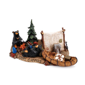 Black bear figurines around campfire scene