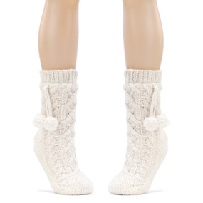 white chunky knit socks with baubles hanging from top on a mannequin's feet