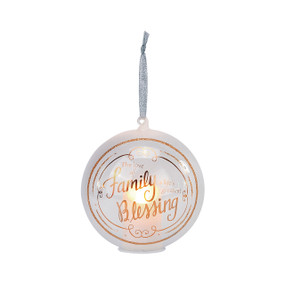 white ball ornament with light inside and The Love of Family is Life's Greatest Blessing printed in gold