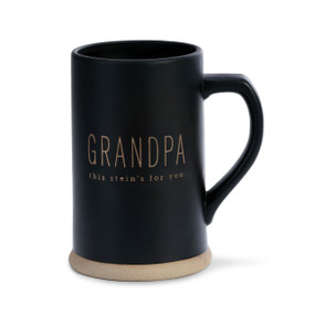 A tall black and tan beer stein that reads "grandpa this stein's for you.".