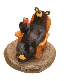 Small black bear figurine holding red cup with lime - sitting in wooden chair on a round plaque that says 'Its 5 o clock somewhere'