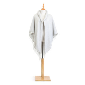 white knit shawl with fringe on hem