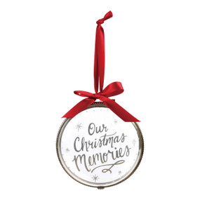 glass ball ornament with Our Christmas Memories and red ribbon