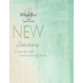 Close view of light blue advertisement with 'new sanctuary' in light blue on it