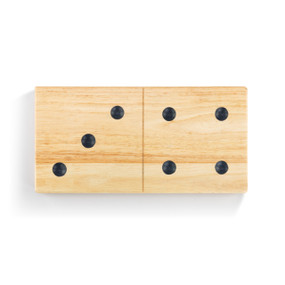 A large light wooden domino game piece with three black dots on the left side, and four black dots on the right side.