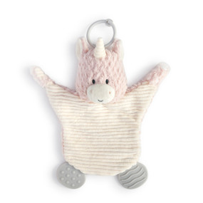 A soft, plush, light pink and cream Unicorn Teething Buddy with a cream stomach, two textured gray tabs, and a light gray ring.