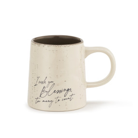 A textured ivory tapered coffee mug with a handwritten message on the front, and brown inner lining.