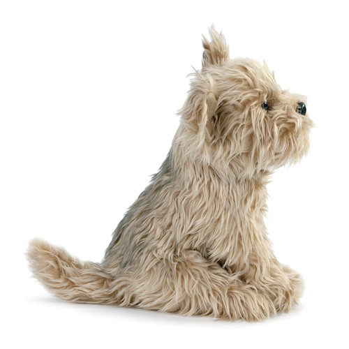 side view of tan fluffy stuffed animal dog