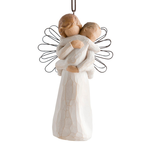 Figure of female in cream dress with wire wings, holding baby in cream onesie, with ornament loop on head