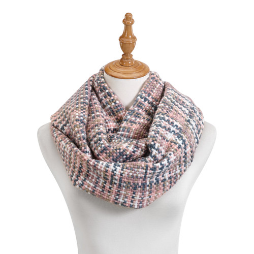 Light pink, navy blue, white pattern scarf around mannequin