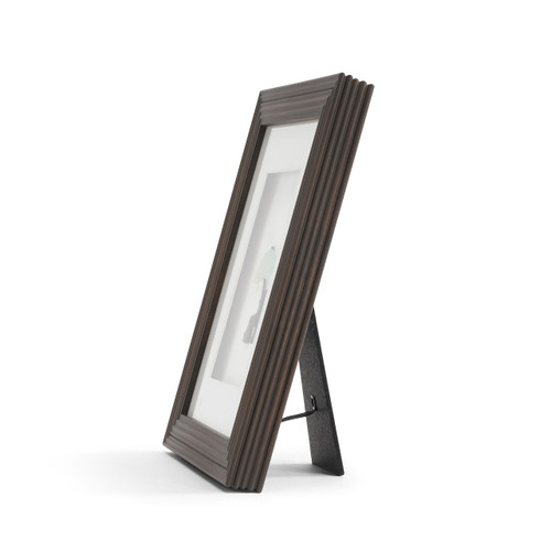 side view of thick dark wood picture frame
