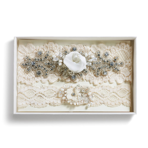 Cream embellished white lace headband inside white box