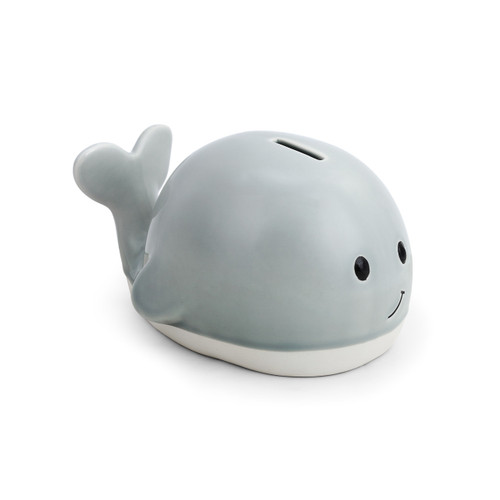 gray ceramic whale bank with smiling face