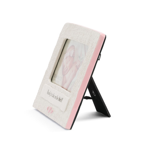 side view of pink rimmed white ceramic photo frame