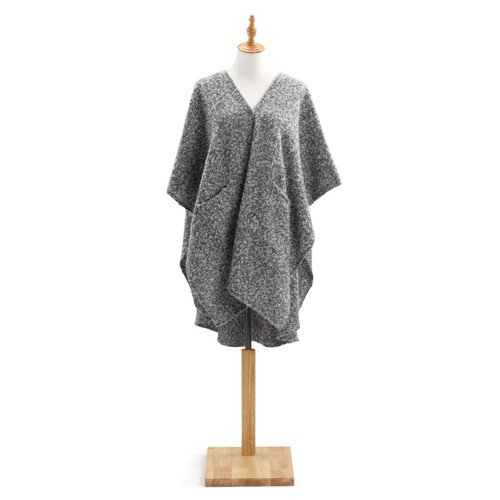 Grey cozy shawl wrap on wooden mannequin stand
