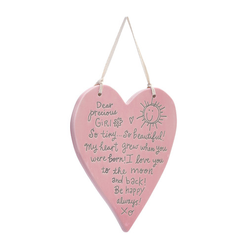 hanging pink ceramic heart with note to baby girl etched into it