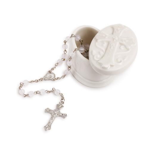 White small rosary box with white embellished rosary silver cross coming out of it