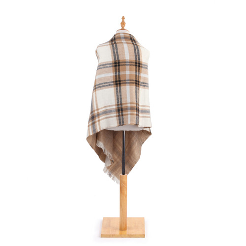 back view of tan plaid poncho