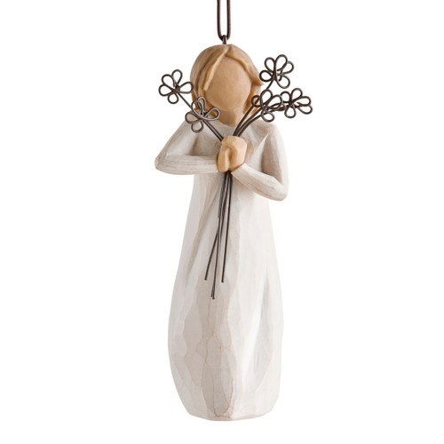 Figure with short light hair in cream dress holding bunch of wire flowers at her face, ornament hook attached to head