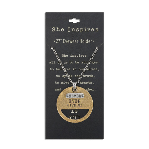 round gold charm on necklace with silver oval attached and Never Ever Give Up etched into it on product label card