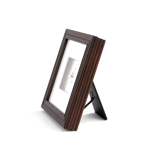 Side view of dark brown photo frame standing up