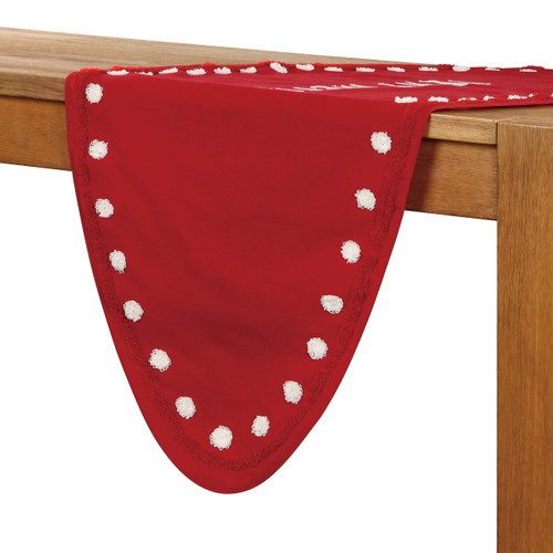 red table runner with white fuzzy polks dots shown half off table