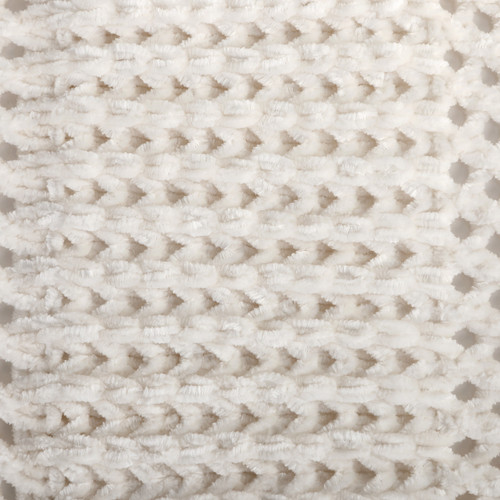 detail shot of cream colored loosely knitted yarn