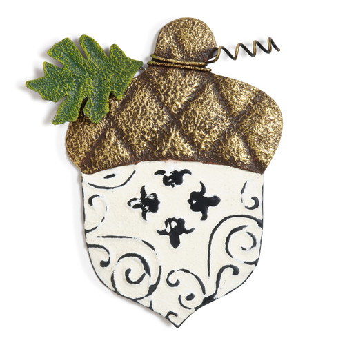 White with black designs acorn platter with golden top and green leaf