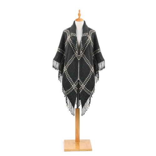 gray cardigan with lighter gray stripes with long hem with fringe