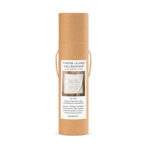 A white wall backdrop that reads "forever + always" in 5 different colors wrapped inside a brown cardboard cylinder with a label.