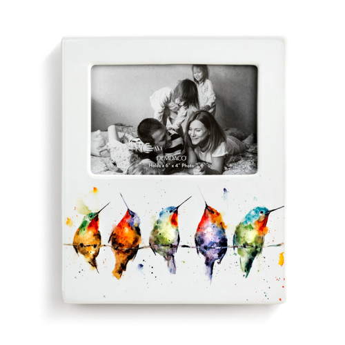 A white ceramic picture frame with five watercolor painted birds on a tree branch on the bottom.