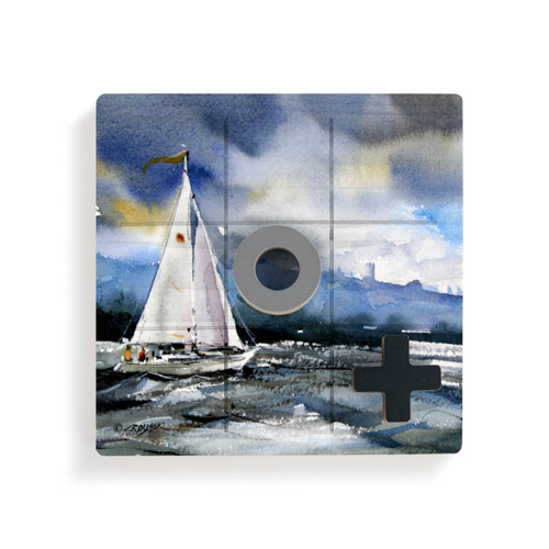 A square wood tic tac toe board with a watercolor image of a sailboat at sea, with a gray O and black X on top.