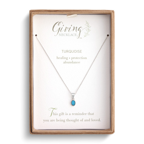 turquoise necklace in packaging box with card that explains qualities of turquoise and gift-giving sentiment