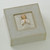 White wooden keepsake box with carved image of faceless young girl praying