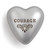 Silver heart figurine with courage brown letters above embellished design